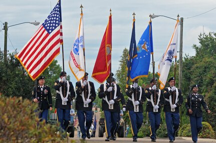 U.S. Army Reserve Soldiers from Headquarters and Headquarters Company, 412th Theater Engineer Command, based in Vicksburg, Miss., form a color guard to march n the 38th-annual Memorial Day Parade in Vicksburg May 29, 2017. They are Master Sgt. Kimberly Jones,  1st Sgt. Richard Broussard, Master Sgt. Michael Christy, Sgt. 1st Class Cornelius Joyner , Staff Sgt. Bollis, Sgt. 1st Class Jeremy Reed, Sgt. Gustavo Salazar and Sgt. 1st Class Laverne Cohill. Hidden from view is Capt. Adam Corley. (U.S. Army Reserve Photo by Sgt. 1st Class Clinton Wood).