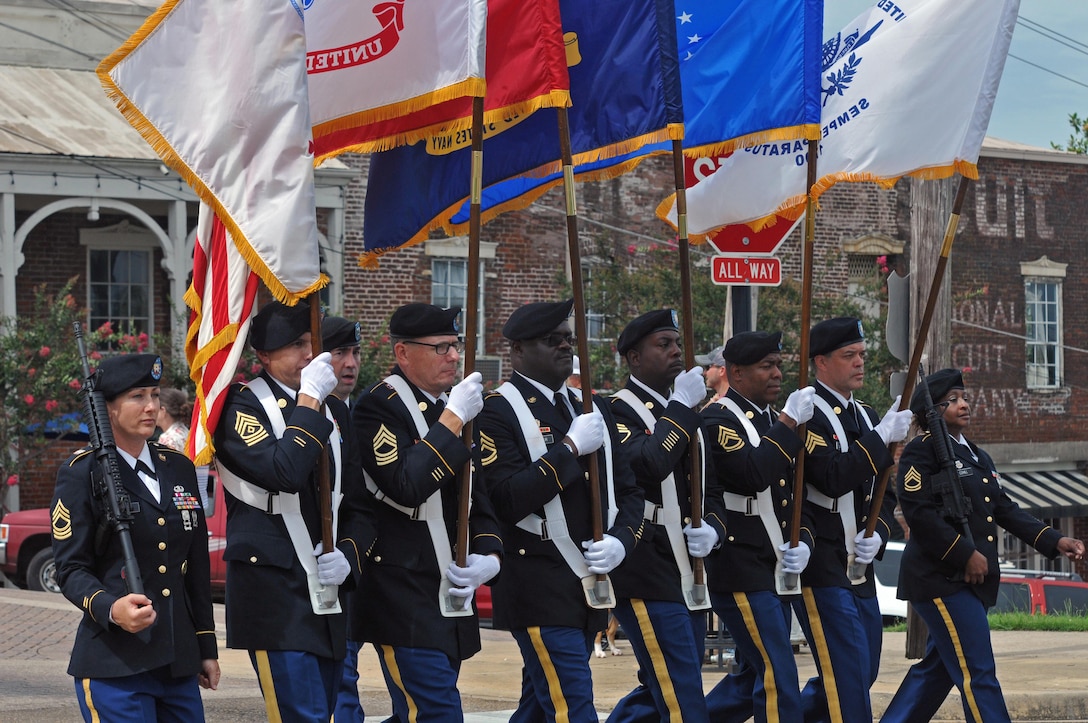 U.S. Army Reserve Soldiers with Headquarters and Headquarters Company, 412th Theater Engineer Command, based in Vicksburg, Miss., form a color guard to march n the 38th-annual Memorial Day Parade in Vicksburg May 29, 2017. They are Master Sgt. Kimberly Jones,  1st Sgt. Richard Broussard, Capt. Adam Corley, Master Sgt. Michael Christy, Sgt. 1st Class Cornelius Joyner , Staff Sgt. Bollis, Sgt. 1st Class Jeremy Reed, Sgt. Gustavo Salazar and Sgt. 1st Class Laverne Cohill. (U.S. Army Reserve Photo by Sgt. 1st Class Clinton Wood).