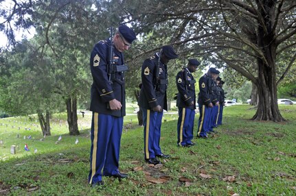 U.S. Army Reserve Master Sgt. Michael Christy, left, Sgt. 1st Class Cornelius Joyner, Staff Sgt. Bolls and Sgt. 1st Class Jeremy Reed, all with Headquarters and Headquarters Company, 412th Theater Engineer Command, based in Vicksburg, Miss., were among the seven company Soldiers who performed a 21-gun salute at the Vicksburg National Cemetery Memorial Day Observance May 29, 2017. (U.S. Army Reserve Photo by Sgt. 1st Class Clinton Wood)