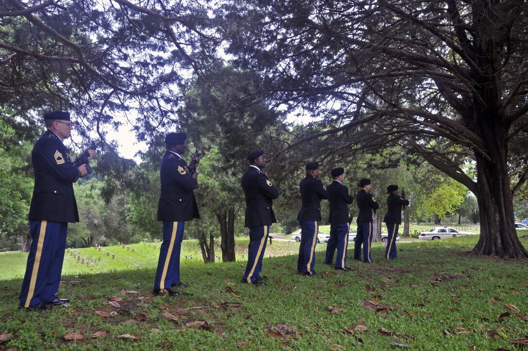 U.S. Army Reserve Master Sgt. Michael Christy, left, Sgt. 1st Class Cornelius Joyner, Staff Sgt. Bolls Sgt. 1st Class Jeremy Reed, Sgt Gustavo Salazar, Master Sgt. Kimberly Jones and Sgt. 1st Class Laverne Cohill, all with Headquarters and Headquarters Company, 412th Theater Engineer Command, based in Vicksburg, Miss., perform a 21-gun salute at the Vicksburg National Cemetery Memorial Day Observance May 29, 2017. (U.S. Army Reserve Photo by Sgt. 1st Class Clinton Wood)