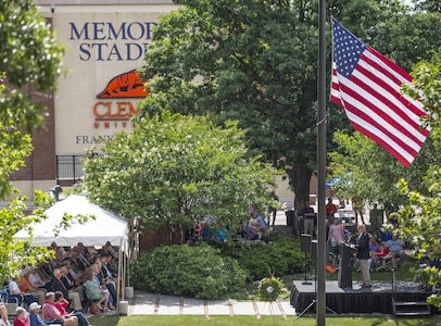 The American flag waves at half-staff during Memorial Day observances in Clemson University’s Memorial Park, May 28, 2017. (U.S. Army Reserve photo by Staff Sgt. Ken Scar)