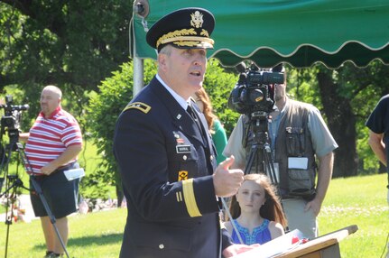 U.S. Army Maj. Gen. Michael Navrkal, mobilization assistant to the U.S. Strategic Command deputy commander, delivers remarks during a Memorial Day ceremony at Forest Lawn Memorial Park in Omaha, Neb., May 29, 2017. During the event, Navrkal joined state and national government leaders, veterans and members of the Omaha-area community, in recognizing the courage, legacy and service of those who gave their lives to guarantee the freedoms and liberties Americans enjoy today. The tradition of honoring fallen war veterans dates back to May 5, 1868, when the head of the Grand Army of the Republic, an organization of Union veterans, established “Decoration Day” as a time for the nation to decorate the graves of the war dead with flowers. The first large observance was held at Arlington National Cemetery, Virginia. In 1971, Memorial Day was declared a national holiday by an act of Congress and was placed on the last Monday of May.