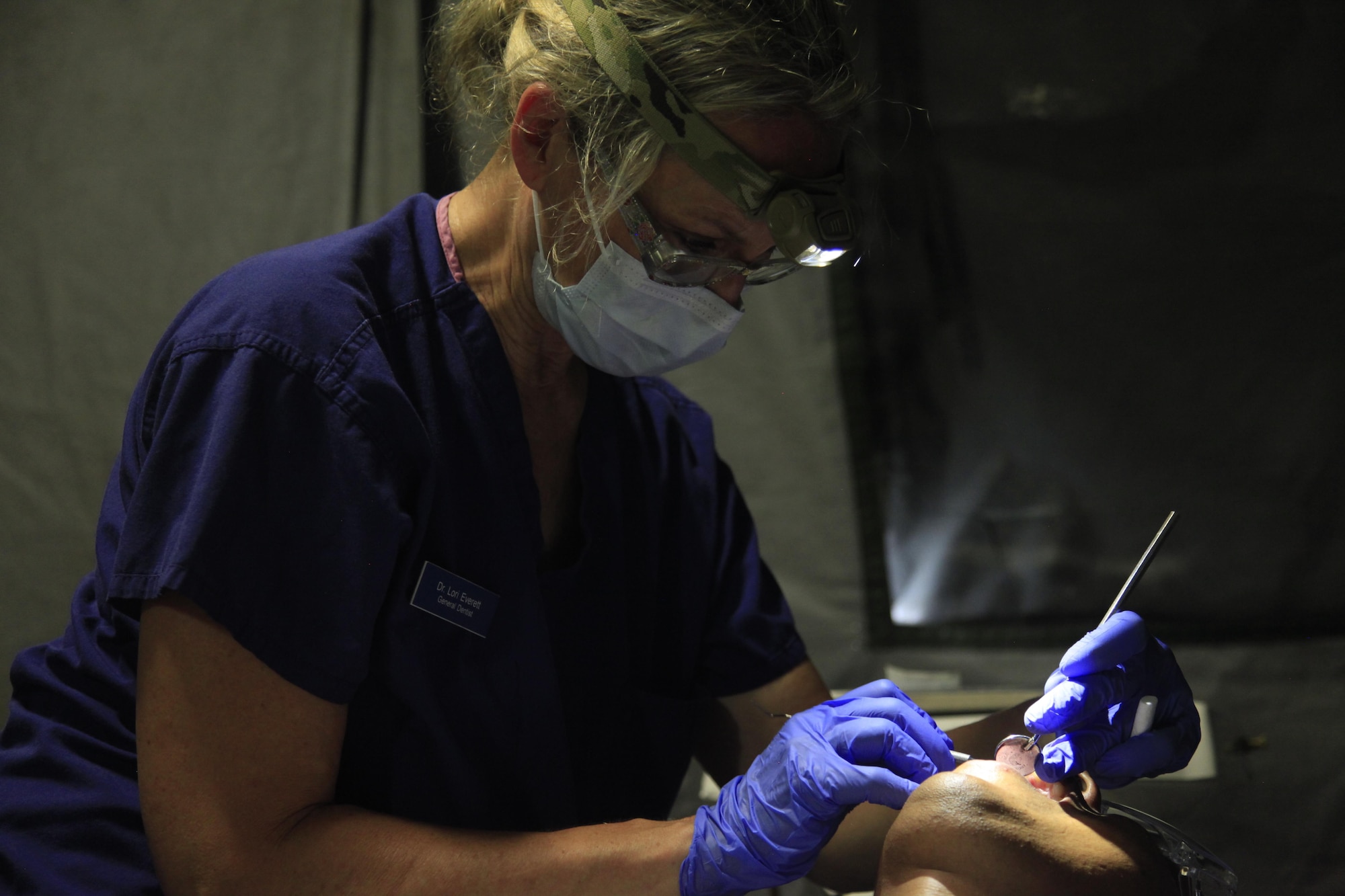 U.S. Air Force Col. Lori Everett, 96th Medical Group, prepares a patient's teeth for a filling at a medical readiness event during in Dangriga, Belize, May 22, 2017. This is the third and final medical event for Beyond the Horizon 2017, a U.S. Southern Command-sponsored, Army South-led exercise designed to provide humanitarian and engineering services to communities in need, demonstrating U.S. support for Belize. (U.S. Army photo by Spc. Kelson Brooks)