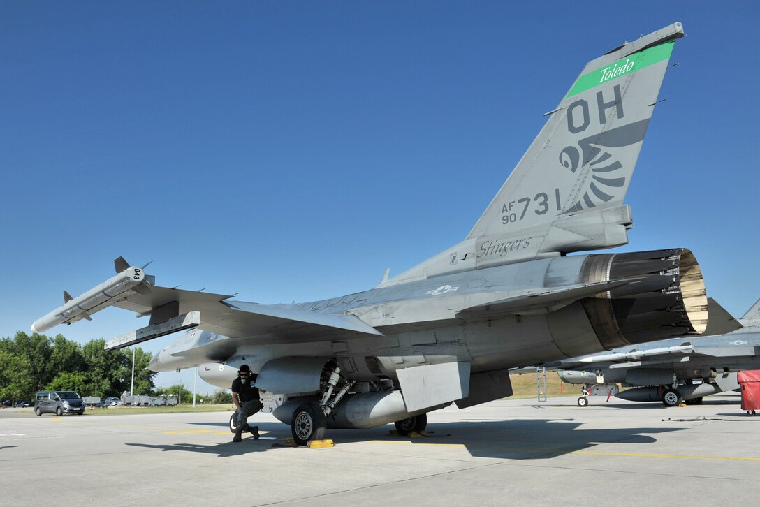 Ohio Air National Guard Air Force Staff Sgt. Steve Bohme conducts a preflight inspection before a training mission during exercise Load Diffuser 17 at Kecskemet Air Base, Hungary, May 26, 2017. Bohme is a mechanic assigned to the Ohio Air National Guard’s 180th Fighter Wing. Air National Guard photo by Air Force Senior Master Sgt. Beth Holliker