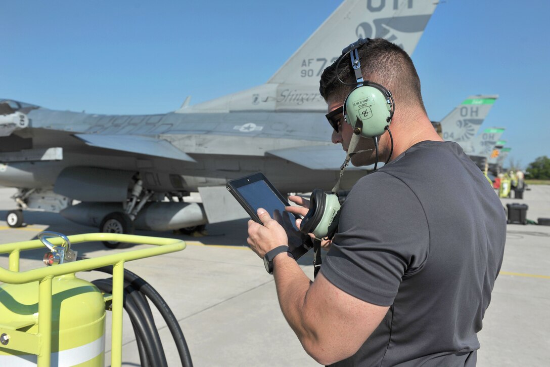 Ohio Air National Guard Air Force Staff Sgt. Steve Bohme reviews preflight inspection procedures before a training mission during exercise Load Diffuser 17 at Kecskemet Air Base, Hungary, May 26, 2017. Bohme is a mechanic assigned to the Ohio Air National Guard’s 180th Fighter Wing. Air National Guard photo by Air Force Senior Master Sgt. Beth Holliker