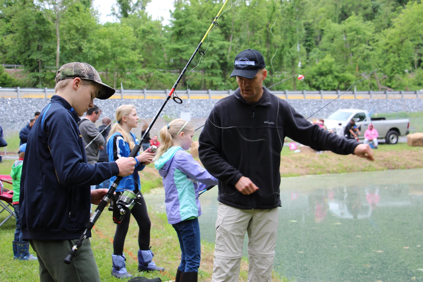 DLA Distribution Susquehanna commander Army Col. Brad J. Eungard participates in the annual Children’s Trout Derby held on May 20 at the Children’s Trout Pond located on Defense Distribution Center Susquehanna.