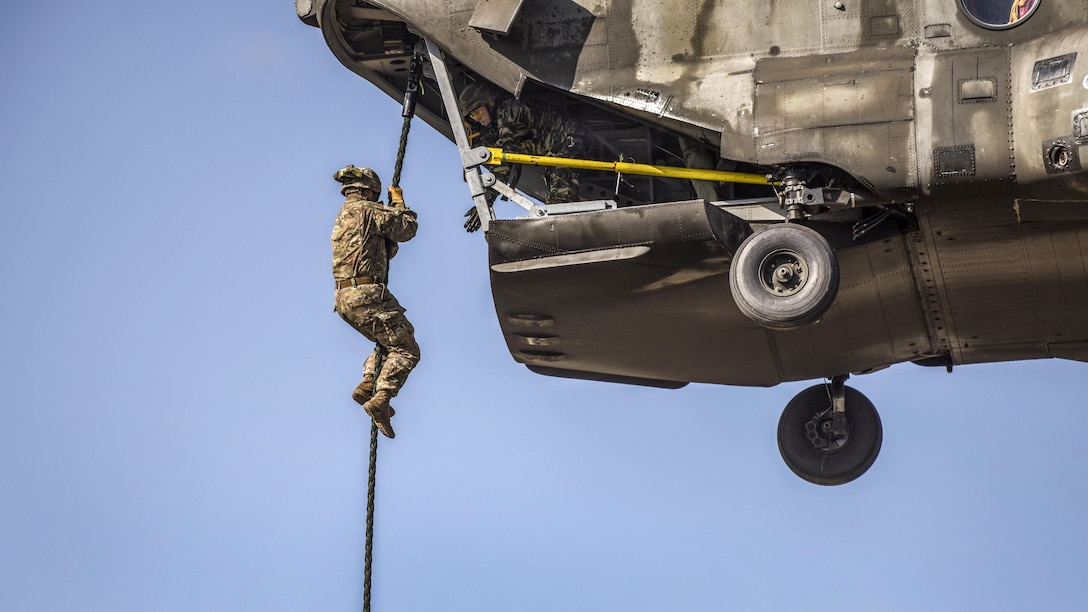 A U.S. soldier assigned to the 173rd Airborne Brigade conducts fast-rope training from a Greek helicopter as part of Exercise Bayonet Minotaur 2017 in Thessaloniki, Greece, May 22, 2017. The U.S.-Greek exercise focused on enhancing NATO operational standards. Army photo by Staff Sgt. Philip Steiner
