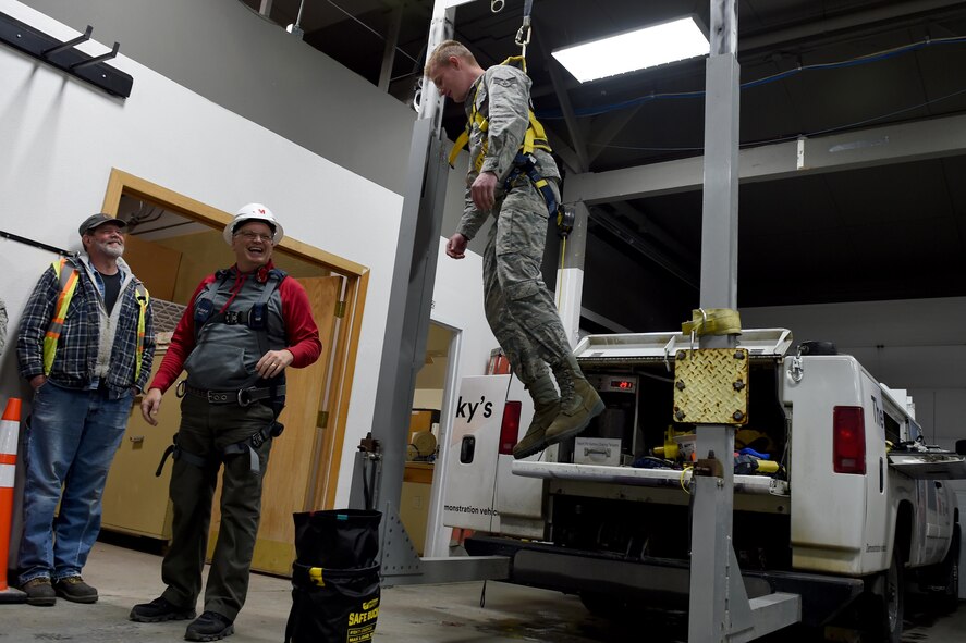 Trace Savage, a fall-protection representative, gives a presentation on fall safety at the civil engineer compound on Joint Base Elmendorf-Richardson, Alaska, May 24, 2017. Occupational-safety agents at JBER teach Check3GPS to mitigate risk and prevent mishaps.