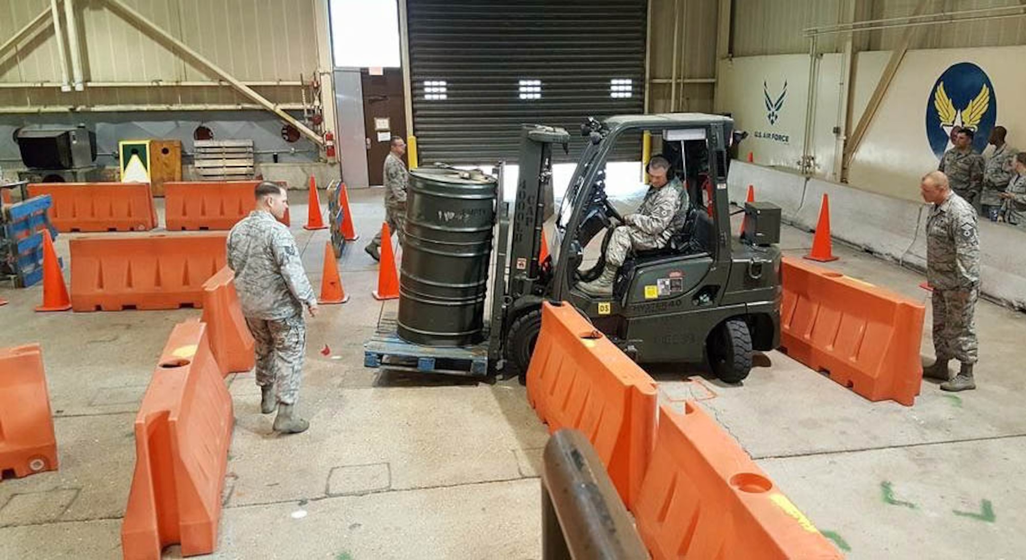 A U.S. Airman maneuvers a 4k forklift through an obstacle course during the Midwest Ground Transportation Rodeo at Fort Leonard Wood, Mo., May 21, 2017. 