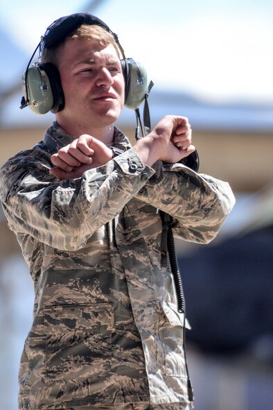 Airman 1st Class Michael Wilkins, a crew chief assigned to the 34th Aircraft Maintenance Unit, launches an F-35 Lightning II aircraft, number 5079, at Hill Air Force Base, Utah, May 22, 2017. In addition to the sortie being the 3,000th in an operational F-35 at Hill, it also turned out to be Wilkens’s first solo launch. (U.S. Air Force photo/Paul Holcomb)