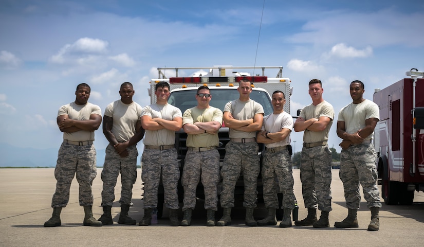 The B-shift Firefighters of the 612th Air Base Squadron before they begin training with the 612th ABS Commander at Joint Task Force-Bravo, May 12th, 2017. The Commander of the 612th ABS participates in a 24-hour shift to understand the training requirements and operational stress to be a firefighter. (U.S. Air Force photo by Senior Airman Julie Kae/released)