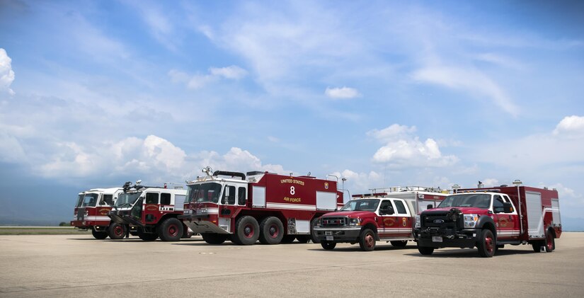 The line-up of the vehicles that the 612th Air Base Squadron Firefighters will instruct the 612th ABS Commander on how to drive at Joint Task Force-Bravo, May 12th, 2017. The Commander of the 612th ABS participates in a 24 hour shift to understand the training requirements and operational stress to be a firefighter.  (U.S. Air Force photo by Senior Airman Julie Kae/released)