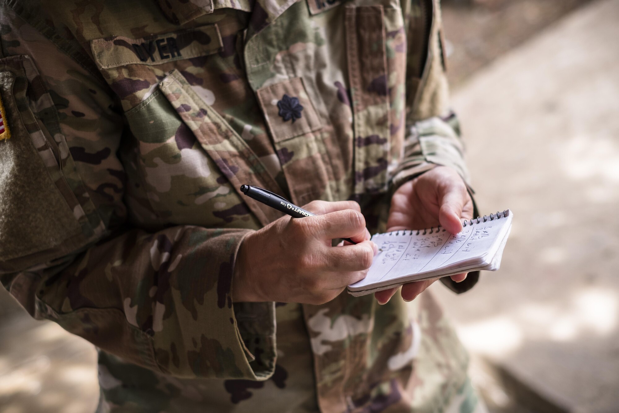 U.S. Army Lt. Col. Rhonda Dyer, Joint Task Force - Bravo, writes down the number of patients and treatment while out on a Community Health Nurse mission in Comayagua, Honduras, May 10, 2017. The CHM is a weekly partnership with the staff at Jose Ochoa Public Health Clinic, administering vaccines, Vitamins, deworming medication and other medical supplies to over 180 Hondurans around the Comayagua area on May 10, 2017.  (U.S. Air National Guard photo by Master Sgt. Scott Thompson/released)