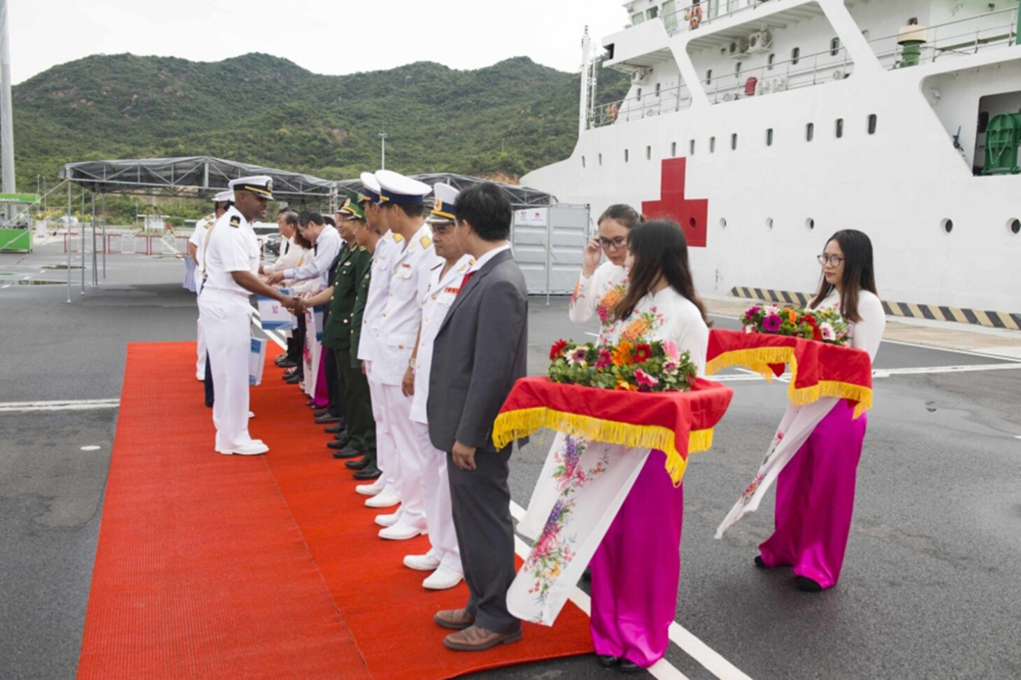 Leadership of Pacific Partnership 2017 and military and civilian officials from Vietnam say goodbye at the departure ceremony for Pacific Partnership 2017 Na Trang, May 29.   Pacific Partnership is the largest annual multilateral humanitarian assistance and disaster relief preparedness mission conducted in the Indo-Asia-Pacific and aims to enhance regional coordination in such as medical readiness and preparedness for manmade and natural disasters. 
