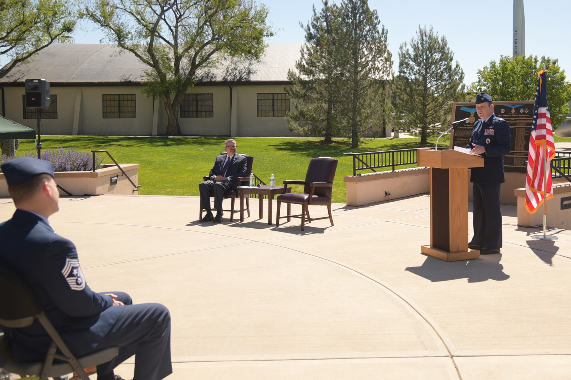 PETERSON AIR FORCE BASE, Colo. - Col. Doug Schiess, 21st Space Wing commander, speaks at the 21st Space Wing’s 25th Anniversary Commemorative Event at the Peterson Air and Space Museum, May 25, 2017, at Peterson Air Force Base, Colo.  During the event, Schiess and Jeff Greene, Colorado Springs Mayor’s chief of staff, unveiled the time capsule that will be sealed after the event and opened on the wing’s 50th anniversary in 2042.  The 21st SW was activated May 15, 1992, under Air Force Space Command. (U.S. Air Force photo by Staff Sgt. Tiffany Lundberg)