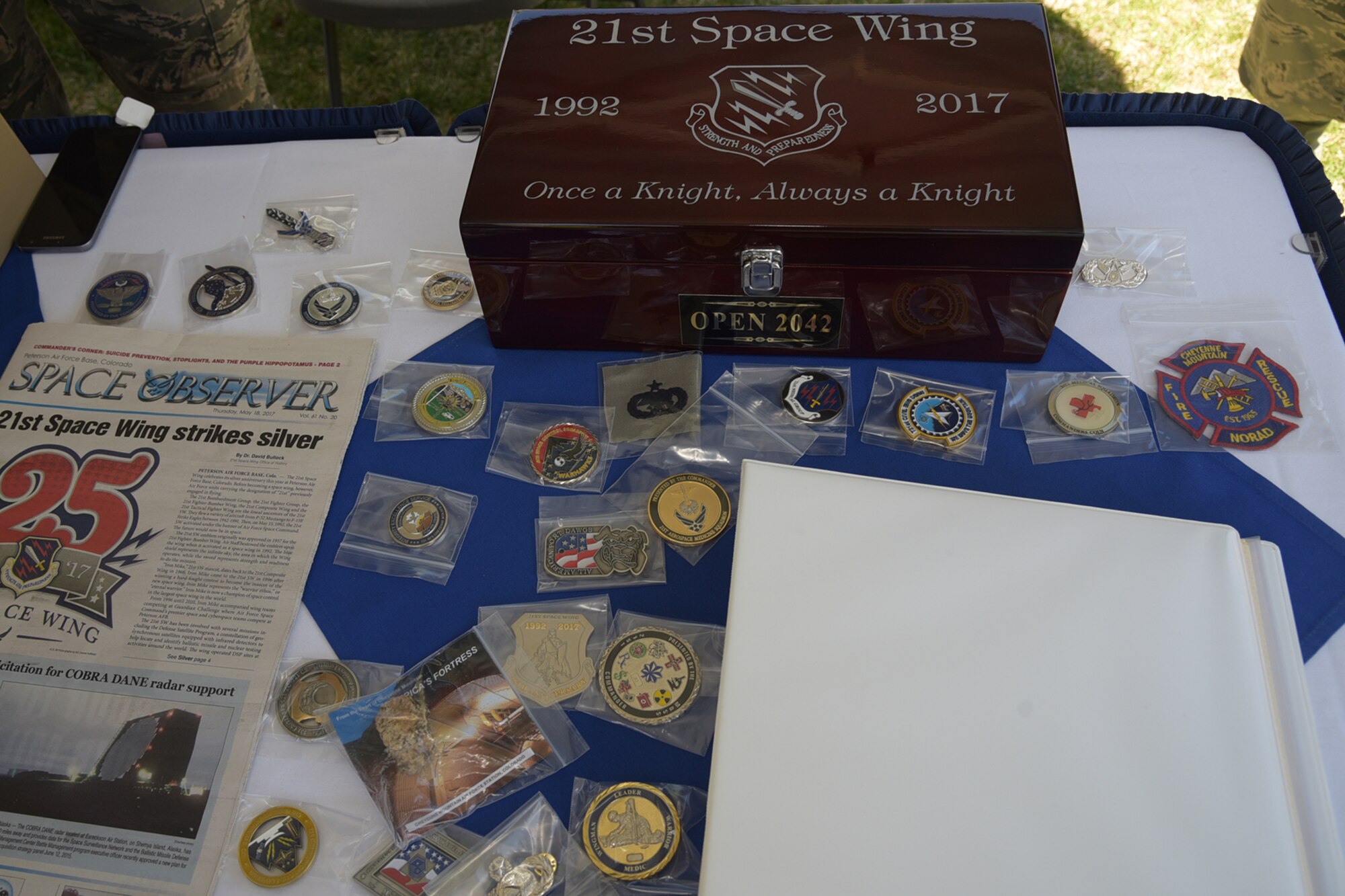 PETERSON AIR FORCE BASE, Colo. - The time capsule is on display at the 21st Space Wing’s 25th Anniversary Commemorative Event at the Peterson Air and Space Museum, May 25, 2017, at Peterson Air Force Base, Colo. The time capsule included photographs, coins, patches, a base 2050 plan, and letters from Col. Doug Schiess, 21st SW commander, and Chief Master Sgt. Mark Bronson, 21st SW command chief. The capsule will be sealed and opened for the 21st SW’s 50th anniversary in 2042. (U.S. Air Force photo by Staff Sgt. Tiffany Lundberg)