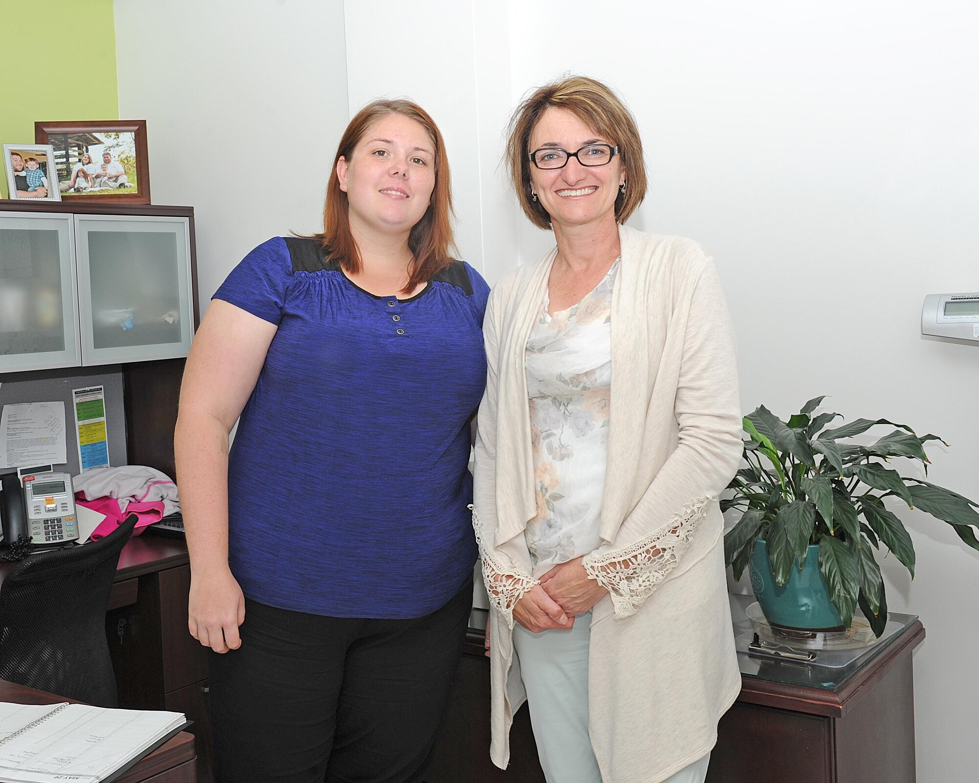 Chelsea Williams, 325th Aerospace Medicine Squadron deployment readiness health assessment nurse (left), and Carolyn Calvin, 325th AMDS deployment nurse practitioner (right), help Airmen to be mission ready for upcoming deployments at Tyndall Air Force Base, Fla., May 25, 2017. Airmen undergo a total of five deployment assessments to ensure the members are healthy and well-adjusted to life after deployment. (U.S. Air Force photo by Airman 1st Class Delaney Rose/ Released)