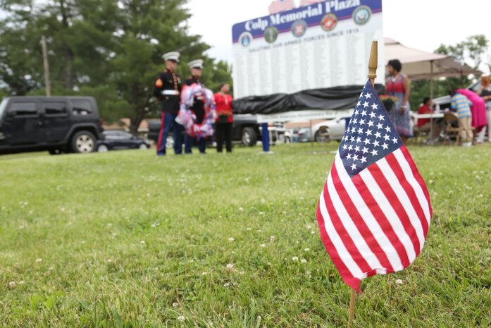 Two Marines with the 9th Marine Corps District, based out of Naval Station Great Lakes, Illinois, were on hand to honor four Montford Point Marines, May 27, at the Colp Area Veterans Celebration, Dedication and Remembrance Ceremony, in Colp, Illinois. Nearly 20,000 African-Americans joined the Marine Corps in 1942, after President Franklin D. Roosevelt issued a “presidential directive giving African Americans an opportunity to be recruited in the Marine Corps,” according to the Montford Point Marines Association website. They didn’t receive recruit training at San Diego or Parris Island, however, but Camp Montford Point, N.C., a segregated training site for African American Marine recruits. For the next seven years, the camp remained opened until it became desegregated. The four Marines are Sol Griffin, Jr.; James L. Kirby, Early Taylor, Jr. and Archibald Mosley. These Marines, among many other Montford Point Marines across the country, were awarded the Congressional Gold Medal, the highest award that can be given to a civilian by Congress, in 2012. (U.S. Marine Corps photo by Gunnery Sgt. Bryan A. Peterson) 