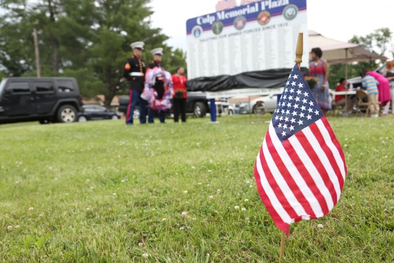 Two Marines with the 9th Marine Corps District, based out of Naval Station Great Lakes, Illinois, were on hand to honor four Montford Point Marines, May 27, at the Colp Area Veterans Celebration, Dedication and Remembrance Ceremony, in Colp, Illinois. Nearly 20,000 African-Americans joined the Marine Corps in 1942, after President Franklin D. Roosevelt issued a “presidential directive giving African Americans an opportunity to be recruited in the Marine Corps,” according to the Montford Point Marines Association website. They didn’t receive recruit training at San Diego or Parris Island, however, but Camp Montford Point, N.C., a segregated training site for African American Marine recruits. For the next seven years, the camp remained opened until it became desegregated. The four Marines are Sol Griffin, Jr.; James L. Kirby, Early Taylor, Jr. and Archibald Mosley. These Marines, among many other Montford Point Marines across the country, were awarded the Congressional Gold Medal, the highest award that can be given to a civilian by Congress, in 2012. (U.S. Marine Corps photo by Gunnery Sgt. Bryan A. Peterson) 