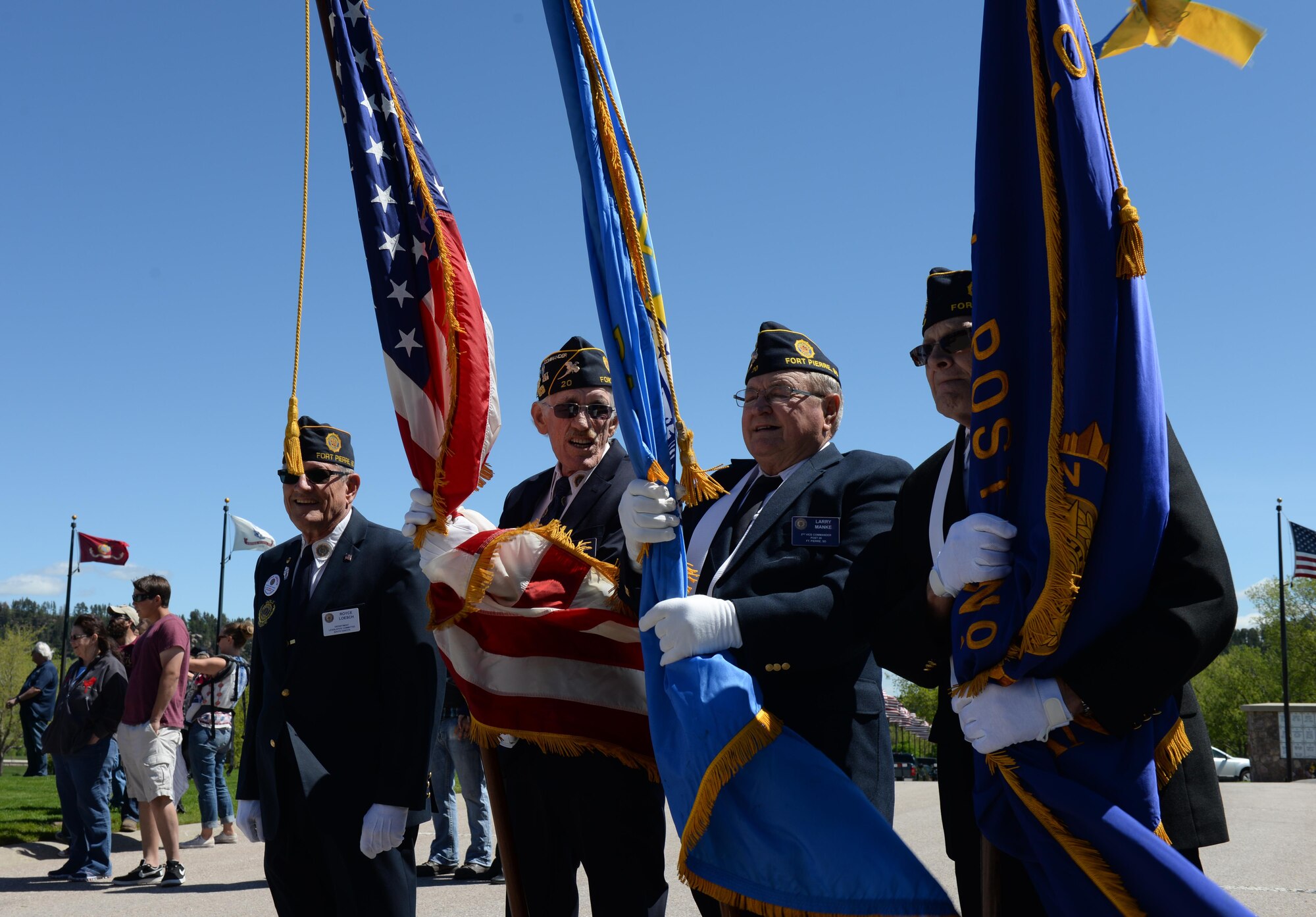 Members of the South Dakota American Legion prepare to post the colors for Memorial Day at the Black Hills National Cemetery, S.D., May 29, 2017. The American Legion helped plan the memorial service that occurred on May 29, and helped place U.S. flags at all the gravestones in the cemetery. (U.S. Air Force photo by Airman Nicolas Z. Erwin)