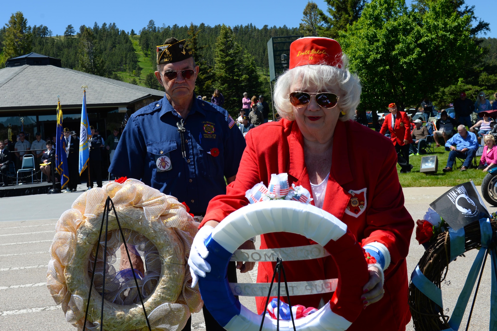 Members of the Military Order of the Cootie lay a wreath during a Memorial Day service at the Black Hills National Cemetery, S.D., May 29, 2017. The floral tributes at funerals exemplify both the beauty and the brevity of life, and evoke memories of other wars and honors fallen service members. (U.S. Air Force photo by Airman Nicolas Z. Erwin)