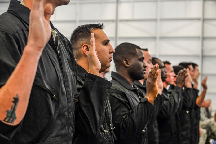 Dedicated crew chiefs assigned to the 57th Wing recite their professional oath during a dedication ceremony at Nellis Air Force Base, Nev., May 19, 2017. Each DCC is assigned an aircraft that they are responsible for maintaining. A dedicated crew chief’s technical knowledge is second-to-none and is heavily relied upon to ensure their aircraft’s mission success. (U.S. Air Force photo by Airman 1st Class Andrew D. Sarver/Released)