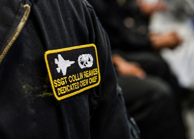 Staff Sgt. Collin Reaves, 57th Aircraft Maintenance Squadron Lightning Aircraft Maintenance Unit F-35 Lightning dedicated crew chief, wears his newly acquired DCC patch at Nellis Air Force Base, Nev., May 19, 2017. To become a DCC, Airmen have to show leadership qualities, motivation and, most importantly, technical knowledge of their assigned aircraft. (U.S. Air Force photo by Airman 1st Class Andrew D. Sarver/Released)