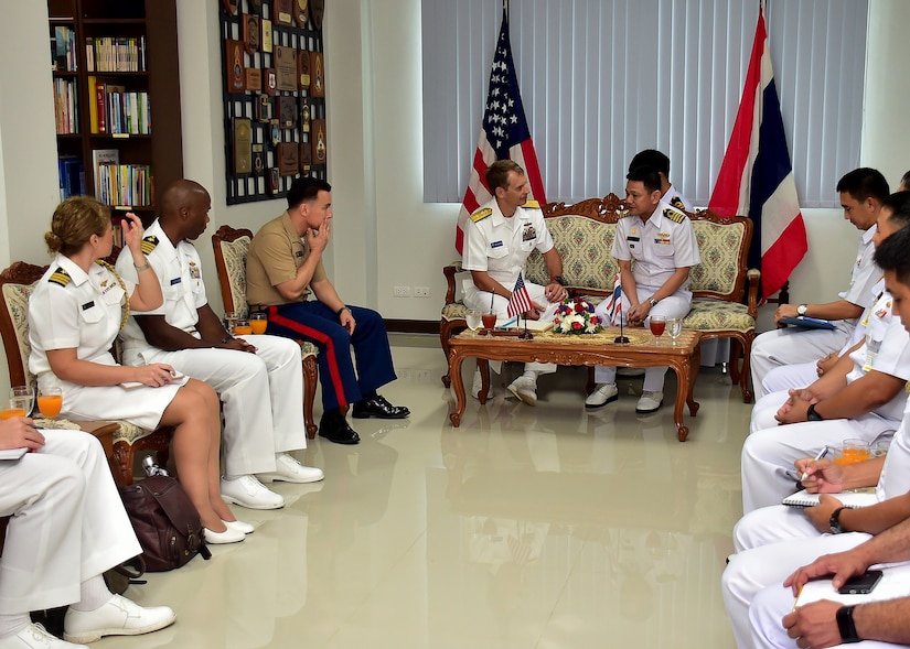 Rear Adm. Don Gabrielson, Commander, Task Force 73, makes an office call with Rear Adm. Chaiyanun Nuntawit, Commander, Frigate Squadron II, on Sattahip Naval Base, Thailand, May 29, 2017. Cooperation Afloat Readiness and Training (CARAT) is a series of PACOM sponsored, U.S. Pacific Fleet led bilateral exercises held annually in South and Southeast Asia to strengthen relationships and enhance force readiness. CARAT exercise events cover a broad range of naval skill areas and disciplines including surface, undersea, air and amphibious warfare; maritime security operations; riverine, jungle and explosive ordnance disposal operations; combat construction; diving and salvage; search and rescue; maritime patrol and reconnaissance aviation; maritime domain awareness; military law, public affairs and military medicine; and humanitarian assistance, disaster response. 