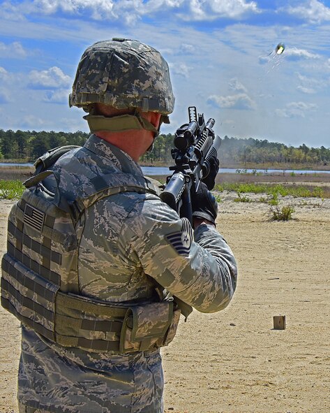 Tech. Sgt. Derrick Bachner live fires the M-203 grenade launcher during annual heavy weapons qualification at Joint Base Maguire-Dix-Lakehurst, N.J.,10 May 2017. (U.S. National Guard photo by SSgt. Andrew Horgan/released)