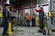 Trace Savage, a fall-protection representative, hoists a volunteer during a fall protection awareness presentation at the civil engineer compound on Joint Base Elmendorf-Richardson, Alaska, May 24, 2017. Occupational-safety agents at JBER teach Check3GPS to mitigate risk and prevent mishaps. 