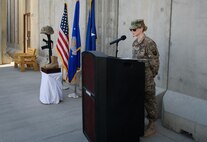 Senior Airman Jessica Hubbard, 455th Expeditionary Medical Group, portrays Senior Airman Jason Cunningham during a Memorial Day ceremony at Bagram Airfield, Afghanistan, May 29, 2017. Cunningham was a pararescueman who, on March 4, 2002, lost his life while saving the lives of ten service members under heavy enemy fire. (U.S. Air Force photo by Staff Sgt. Benjamin Gonsier)