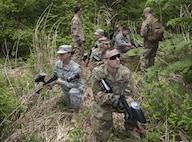 U.S. Soldiers with the Delta Detachment, 1st Space Company, Joint Tactic Army Ground Station, halt during a tactical exercise at Misawa Air Base, Japan, May 24, 2017. Members worked in two separate teams, alpha and bravo. They were tasked with an objective to secure an area while under fire as well as maintaining communication among each other. (U.S. Air Force photo by Airman 1st Class Sadie Colbert)