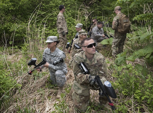 U.S. Soldiers with the Delta Detachment, 1st Space Company, Joint Tactic Army Ground Station, halt during a tactical exercise at Misawa Air Base, Japan, May 24, 2017. Members worked in two separate teams, alpha and bravo. They were tasked with an objective to secure an area while under fire as well as maintaining communication among each other. (U.S. Air Force photo by Airman 1st Class Sadie Colbert)
