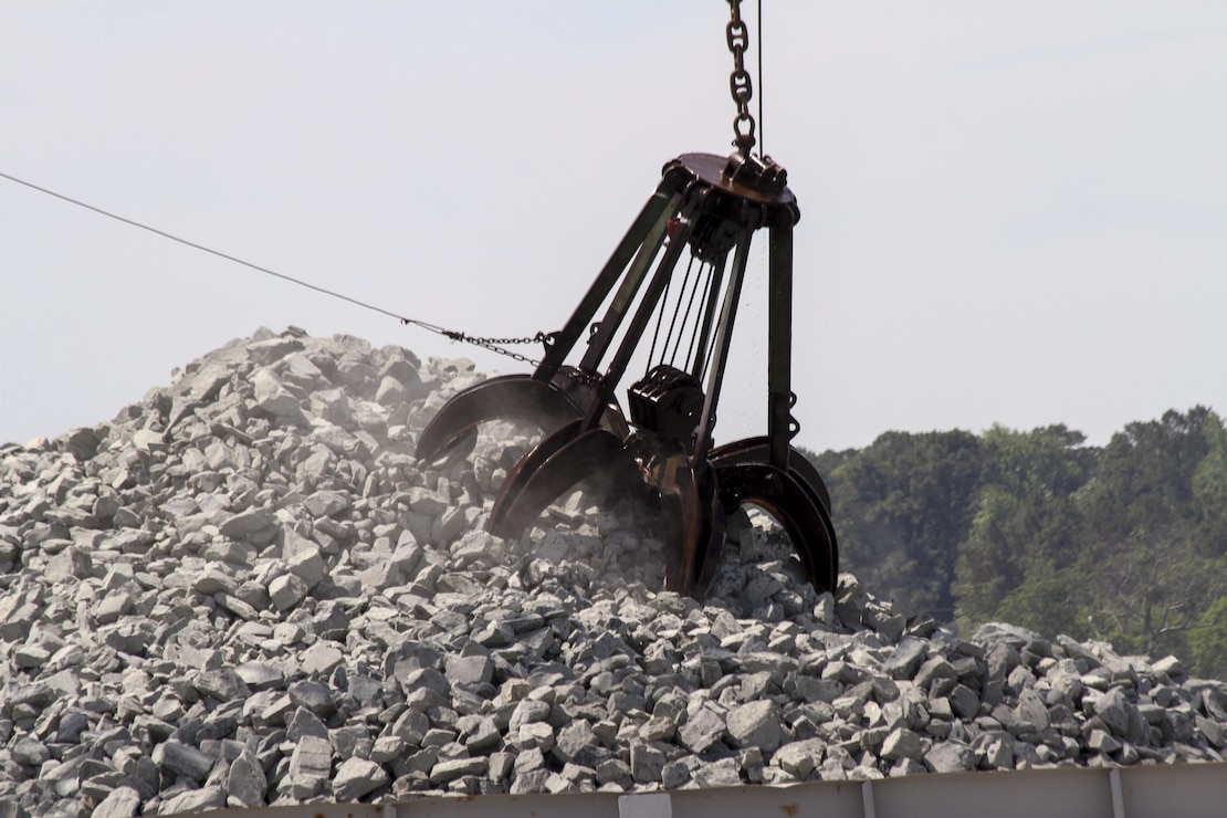 MATHEWS COUNTY, VA – Contractors use a crane to place granite along the bottom of the Piankatank River near Gwynn, Virginia.  The granite is being used to create 25 acres of new sanctuary reef habitat for oysters in the river.  (U.S. Army photo/Patrick Bloodgood)