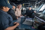 ARABIAN GULF (May 21, 2017) Rear Adm. Bruce Lindsey, commander of Naval Air Force Atlantic, meets with Sailors aboard the aircraft carrier USS George H.W. Bush (CVN 77). The ship is deployed in the U.S. 5th Fleet area of operations in support of maritime security operations designed to reassure allies and partners, and preserve the freedom of navigation and the free flow of commerce in the region. (U.S. Navy photo by Mass Communication Specialist 3rd Class Christopher Gaines/Released)