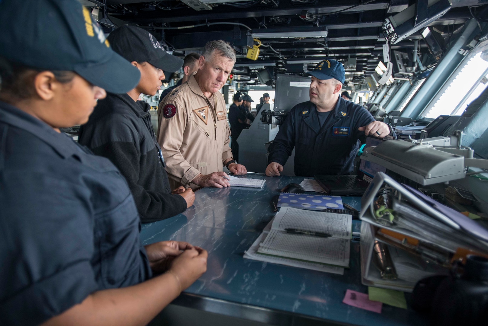 ARABIAN GULF (May 21, 2017) Rear Adm. Bruce Lindsey, commander of Naval Air Force Atlantic, meets with Sailors aboard the aircraft carrier USS George H.W. Bush (CVN 77). The ship is deployed in the U.S. 5th Fleet area of operations in support of maritime security operations designed to reassure allies and partners, and preserve the freedom of navigation and the free flow of commerce in the region. (U.S. Navy photo by Mass Communication Specialist 3rd Class Christopher Gaines/Released)