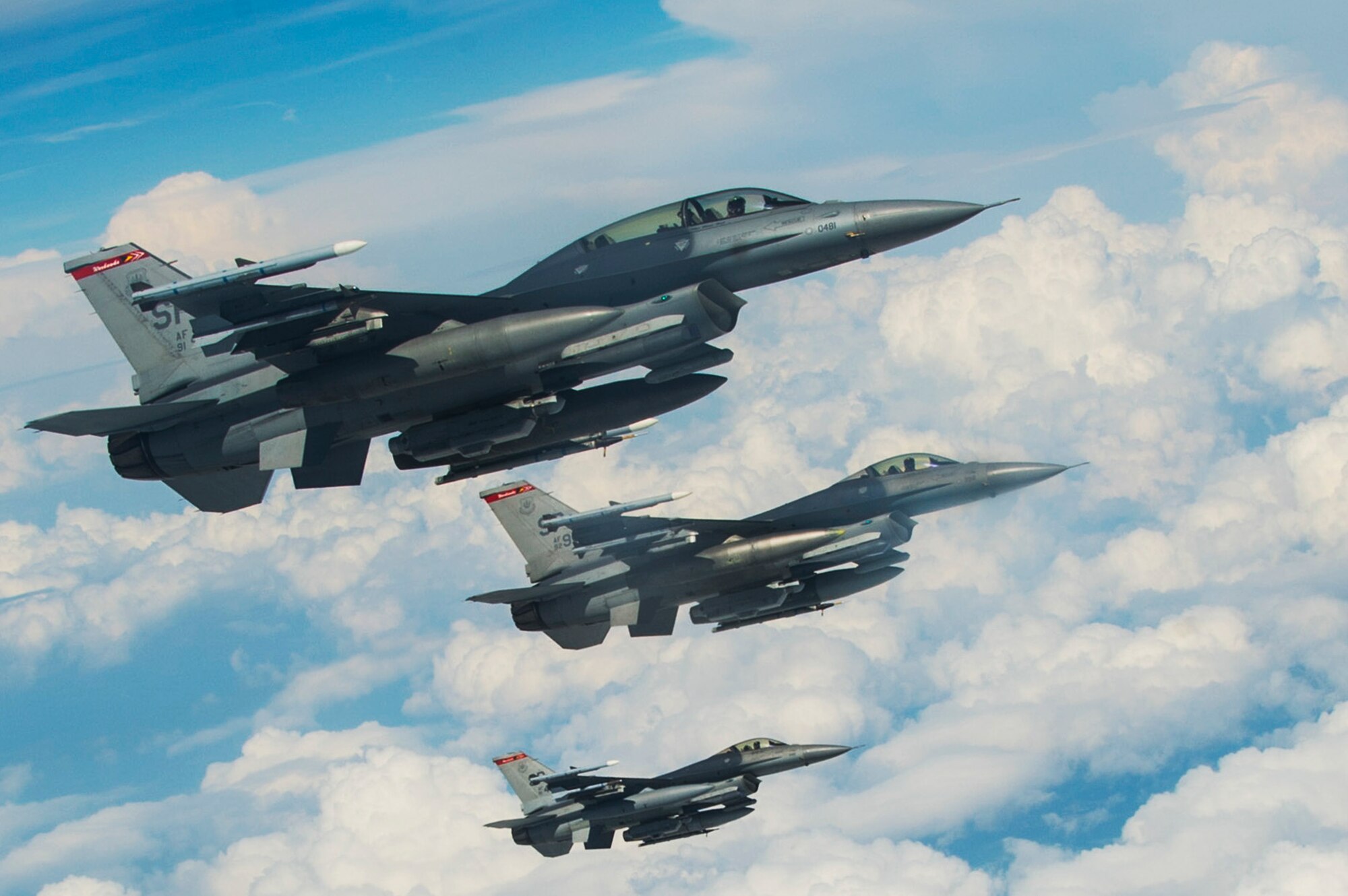 Three U.S. Air Force F-16 Fighting Falcons from the 480th Fighter Squadron fly beside an 185th Air Refueling Wing, Sioux City, Iowa KC-135 Stratotanker over Spangdahlem Air Base, Germany, May 30, 2017. For more than a week the Iowa Air National Guard has been conducting air-to-air refueling training with fighting falcons from the 52nd Fighter Wing. (U.S. Air Force photo by Senior Airman Dawn M. Weber)