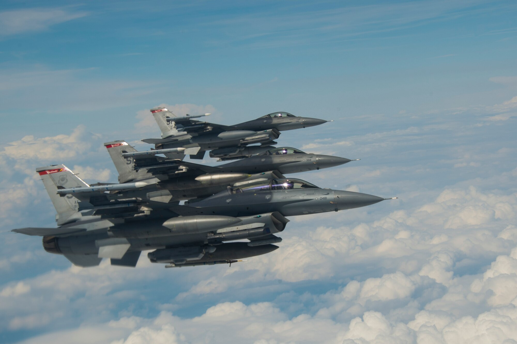 Three U.S. Air Force F-16 Fighting Falcons assigned to the 480th Fighter Squadron fly in formation over Spangdahlem Air Base, Germany, May 30, 2017. The 185th Air Refueling Wing Air National Guard of Sioux City, Iowa will be conducting air-to-air refueling training May 21 – June 2. (U.S. Air Force photo by Senior Airman Dawn M. Weber)