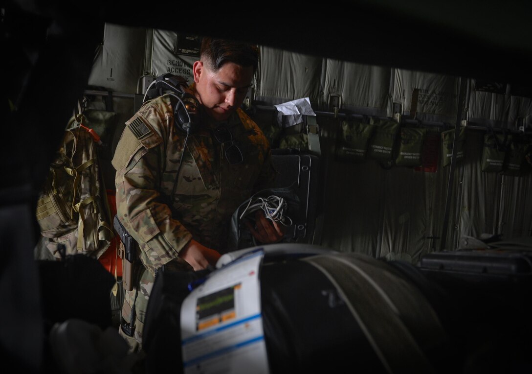 A medical technician from the 379th Expeditionary Aeromedical Evacuation Squadron checks medical equipment on a patient transport May 19, 2017. The 379th EAES provides intra- and inter-theater aeromedical evacuation for service members throughout the area of responsibility. A typical mission includes transporting patients to locations with more definitive medical care or returning recovered personnel to duty at their deployed locations. (U.S. Air Force photo by Staff Sgt. Michael Battles)