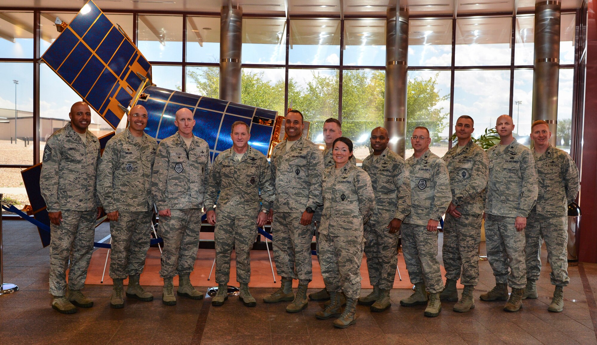 Gen. David L. Goldfein, Chief of Staff of the U.S. Air Force, poses with Team Buckley leadership in the Mission Control Station May 25, 2017, on Buckley Air Force Base, Colo. During his visit, Goldfein walked through several static displays for a mission brief from the 140th Wing, met with space operators from the 460th Operations Group and toured the Aerospace Data Facility-Colorado. (U.S. Air Force photo by Airman 1st Class Holden S. Faul/ Released)