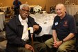 Chief Warrant Officer 4 (Ret.) Charlie Price, who served as a Tuskegee Airman and with the 98th Training Division (Initial Entry Training), sits with Command Sgt. Maj. (Ret.) Eugene Porter, who was the first division command sergeant major for the 98th Training Division (IET), after the 98th Alumni Luncheon on April 20, 2017 in Rochester, New York. Price, 94, and Porter, 91, said they enjoy coming to the luncheons for the camaraderie. (U.S. Army Reserve photo by Maj. Michelle Lunato/Released)