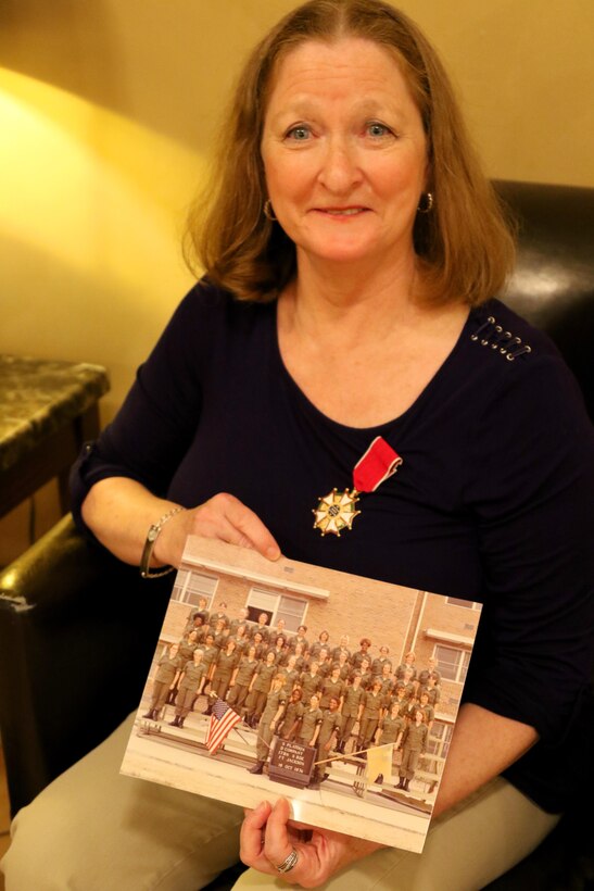 Sgt. Maj. (Ret.) Jane Decker, the last division personnel sergeant major for the 98th Training Division (Initial Entry Training), looks back at her unit photo from basic training at Fort Jackson, S.C. in 1974. Decker was originally part of the Women’s Army Corps. A few years later, Decker transferred to the U.S. Army Reserve and served over 40 years as a Citizen-Soldier. The Spencerport, New York resident was awarded a Legion of Merit during a 98th Alumni Luncheon on April 20, 2017 in Rochester, New York. (U.S. Army Reserve photo by Maj. Michelle Lunato/Released)