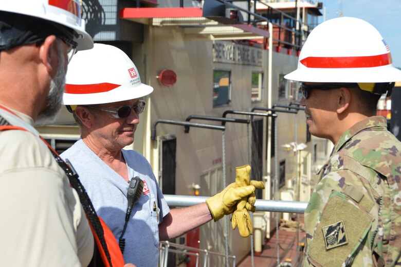 Recently BG Toy, Commanding General, Great Lakes and Ohio River Division, visited the Heavy Fleet of the Regional Rivers Repair Fleet (R3F) at Meldahl Locks and Dam. The Heavy Fleet is currently replacing Miter Gates and BG Toy was able to get a firsthand look at the work and spend some time with the crews of the fleet and the locks and dam.    BG Toy receives an update on the day's operations from Shift Supervisor Bill Adkins.