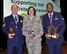 Master Sgt. Douglas Lemp, an air transportation specialist assigned to the Reserve wing’s 39th Aerial Port Squadron, and Senior Airman Elliott Jones, an emergency management specialist assigned to the 302nd Civil Engineer Squadron, pose for a photo with Chief Master Sgt. Vicki Robertson, 302nd Airlift Wing command chief after the Colorado Springs Armed Forces Week Enlisted Awards ceremony held May 15, 2017 in Colorado Springs, Colorado. (U.S. Air Force photo/Ann Skarban)