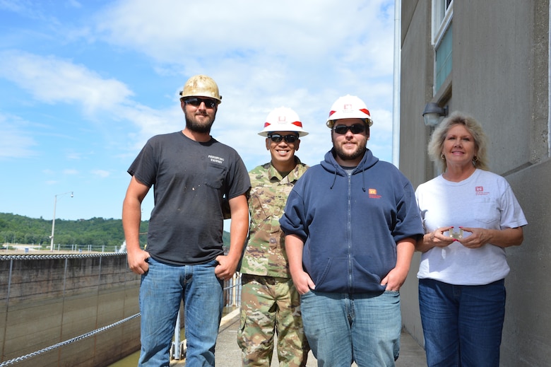 BG Mark Toy, Commanding General, Great Lakes and Ohio River Division presented Commander's Coins for Excellence to Kathy Eubanks, Chris Wilson and Travis Morgan during his recent visit to Meldahl Locks and Dam. General Toy was there to visit the Heavy Fleet while they were dewatering the main chamber in preparation of a miter gate replacement. Kathy Eubanks, Chris Wilson and Travis Morgan were recognized for their outstanding performance in the day-to-day operation of this critical piece of infrastructure.