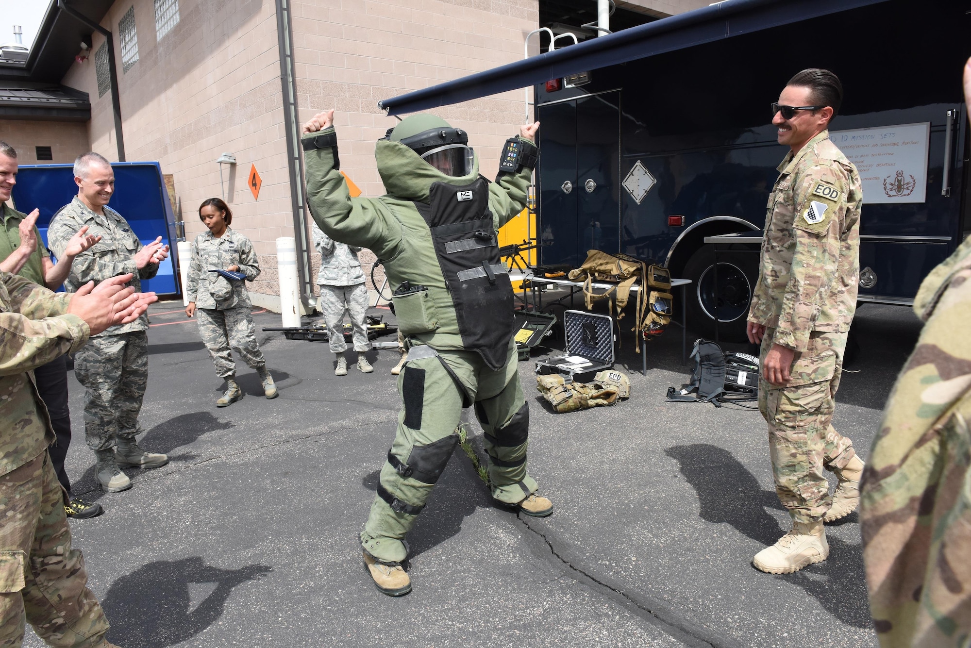 Maj. Gen. Marc Sasseville, Deputy Director of the Air National Guard, tries on the bomb suit while visiting with the 140th Explosive Ordnance Disposal Flight at Buckley Air Force Base May 7. (U.S. Air National Guard photo by Staff Sgt. Michelle Alvarez-Rea)