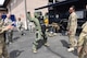 Maj. Gen. Marc Sasseville, Deputy Director of the Air National Guard, tries on the bomb suit while visiting with the 140th Explosive Ordnance Disposal Flight at Buckley Air Force Base May 7. (U.S. Air National Guard photo by Staff Sgt. Michelle Alvarez-Rea)