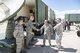 Gen. David Goldfein, Chief of Staff of the U.S. Air Force, speaks with Senior Airmen Daniel McCeery and Louis White, and Lieutenant Col. Mike Lockette, 233d Space Group, during his visit to Buckley Air Force Base May 25. (U.S. Air National Guard Photo by Senior Master Sgt. John Rohrer)