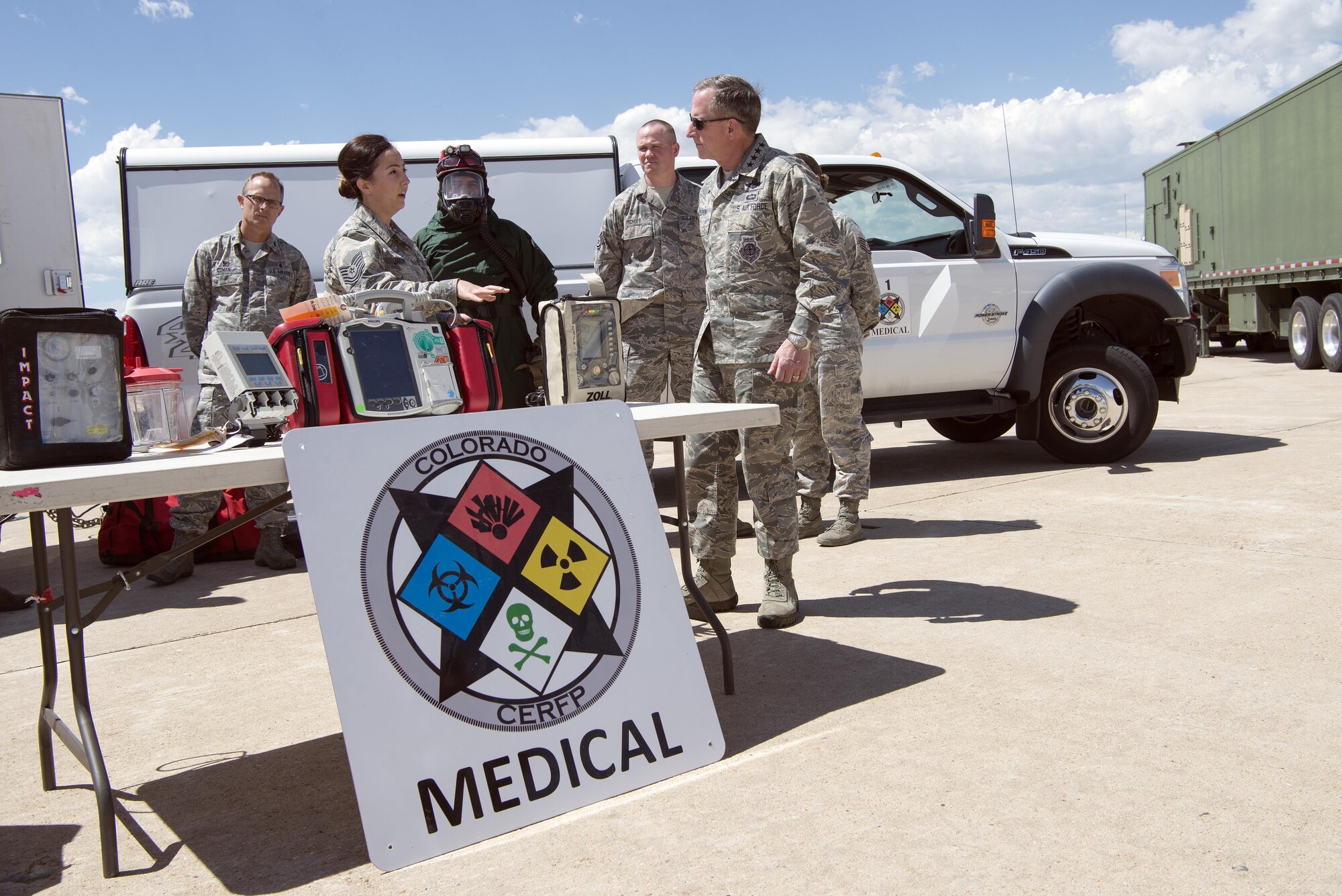 Gen. David Goldfein, Chief of Staff of the U.S. Air Force, speaks with TSgt Adriana Jakupi, CERFP medic, 140th Medical Group, during his visit to Buckley Air Force Base May 25. (U.S. Air National Guard Photo by Senior Master Sgt. John Rohrer)