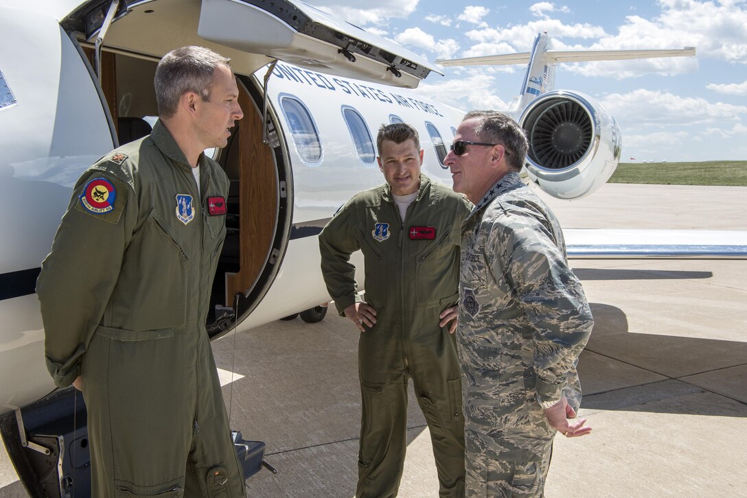 Gen. David Goldfein, Chief of Staff of the U.S. Air Force, speaks with Maj. Brian Jacobsen and Maj. Coy Egbert, pilots, 200th Airlift Squadron, during his visit to Buckley Air Force Base May 25. (U.S. Air National Guard Photo by Senior Master Sgt. John Rohrer)